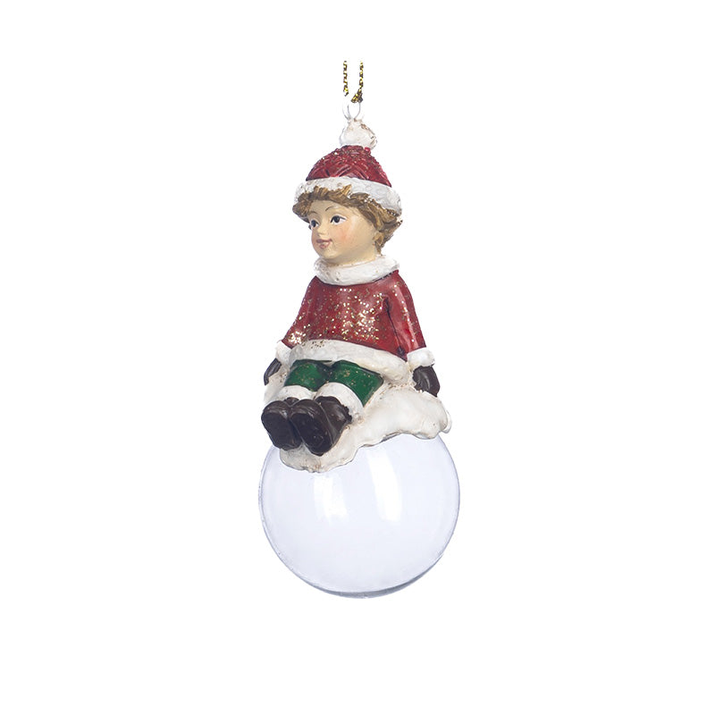 Julbarn på glaskula